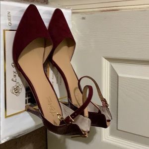2inch Burgundy heel open on the side.